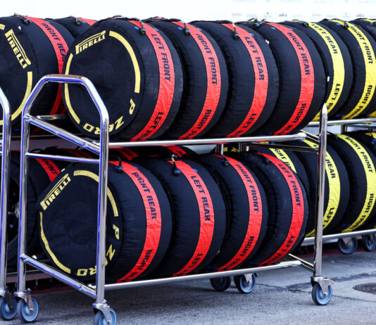 How do tyre blankets work? Rows of Formula 1 tyres in tyre blankets stacked in a trolley